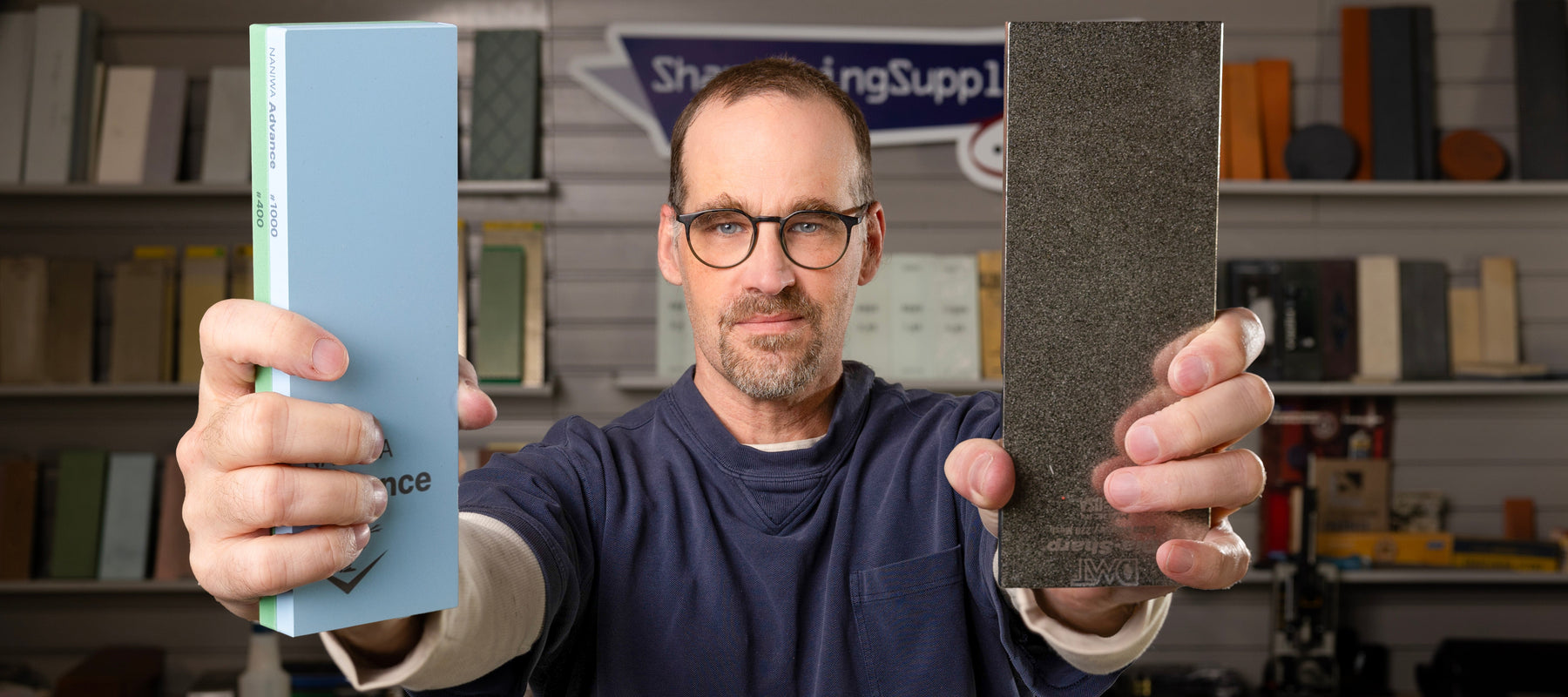 Sharpening Expert Dan holding two sharpening stones